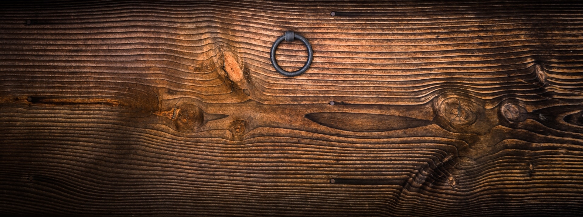 https://www.pexels.com/photo/gray-metal-door-knocker-on-wooden-panel-161922/
